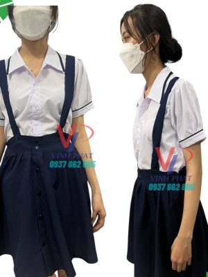 Đồng phục đi học học sinh nữ cấp 1 - Bộ váy đầm liền áo sơ mi cổ bèo nơ hai  viền cùng chân váy xòe xếp ly xanh đen | Hàng